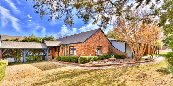 photo of rock home at monastery at forest lake in oklahoma city