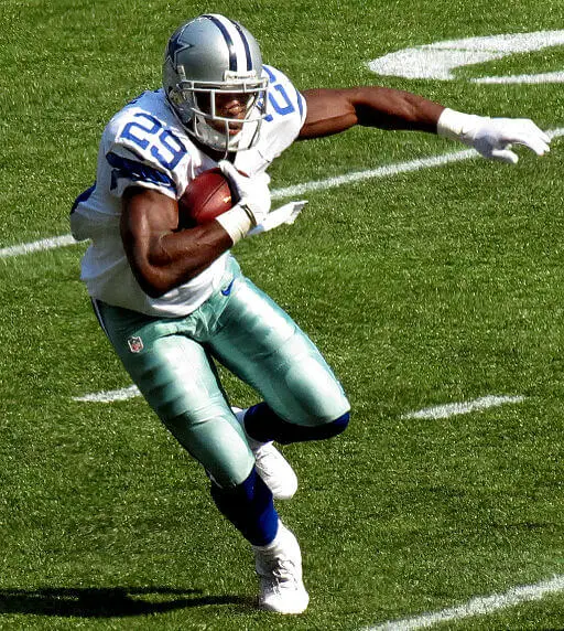 DeMarco Murray running with a football during a game