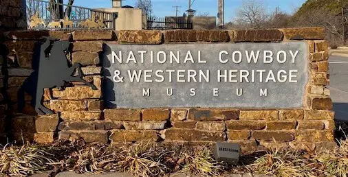 sign in front of museum that says national cowboy and western heritage museum