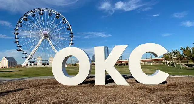 okc letters with ferris wheel in background