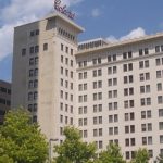 The Colcord Hotel, a stone multi story hotel