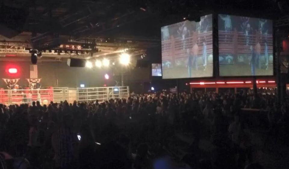 indoor bull riding arena with crowd