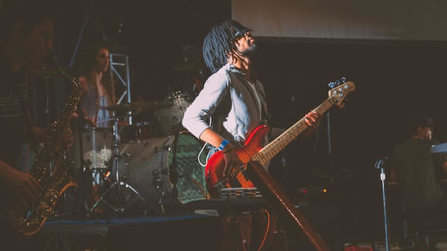 musicians on stage playing instruments