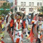 native americans dancing in a parade