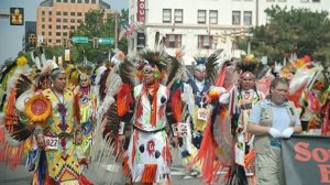 native americans dancing in a parade