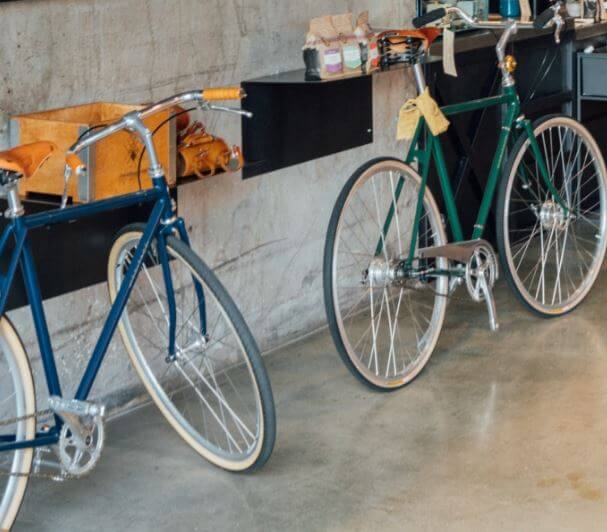 2 bicycles parked in a store