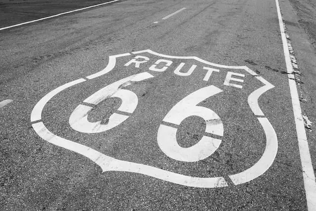 route 66 sign painted on the road