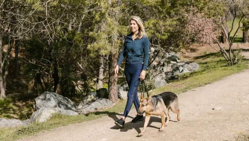 woman walking with a dog